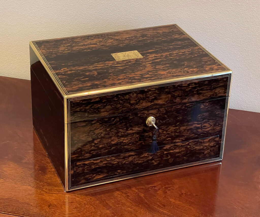 Front left view of an Antique Silver Mounted Dressing Case in Coromandel, by William Tooke.