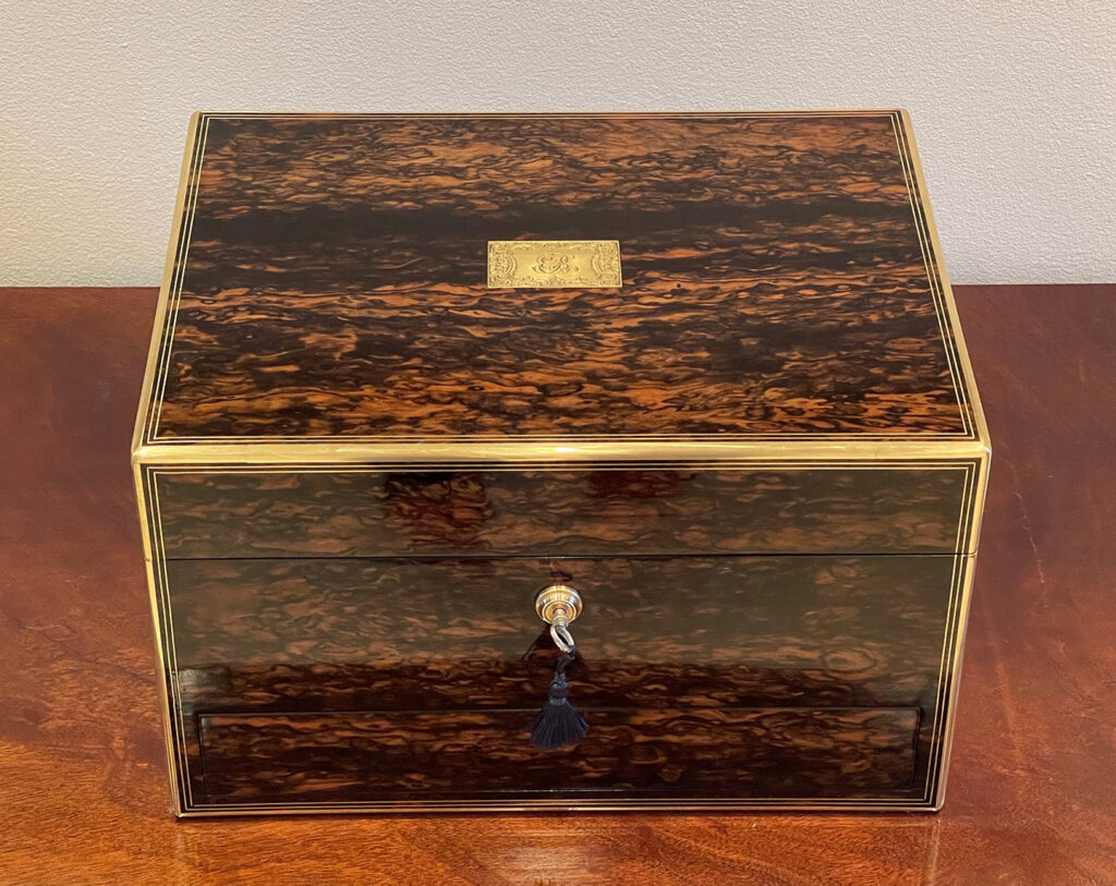 Overhead view of an Antique Silver Mounted Dressing Case in Coromandel, by William Tooke.
