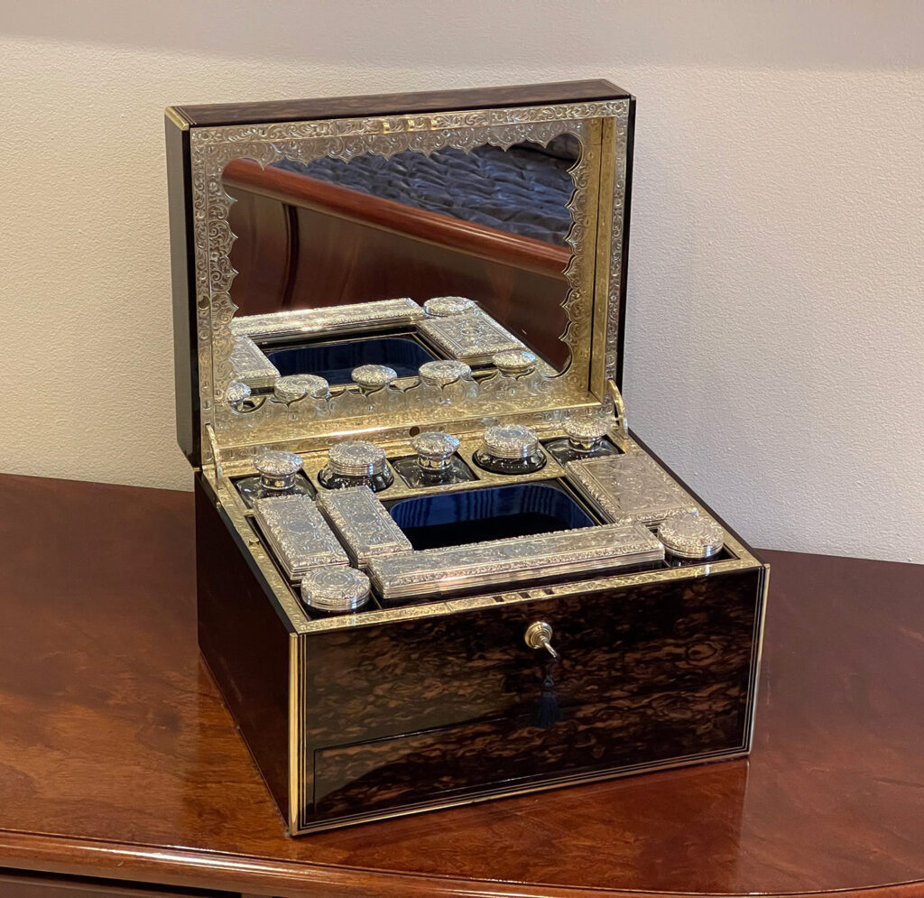 Front left internal view of an Antique Silver Mounted Dressing Case in Coromandel, by William Tooke.