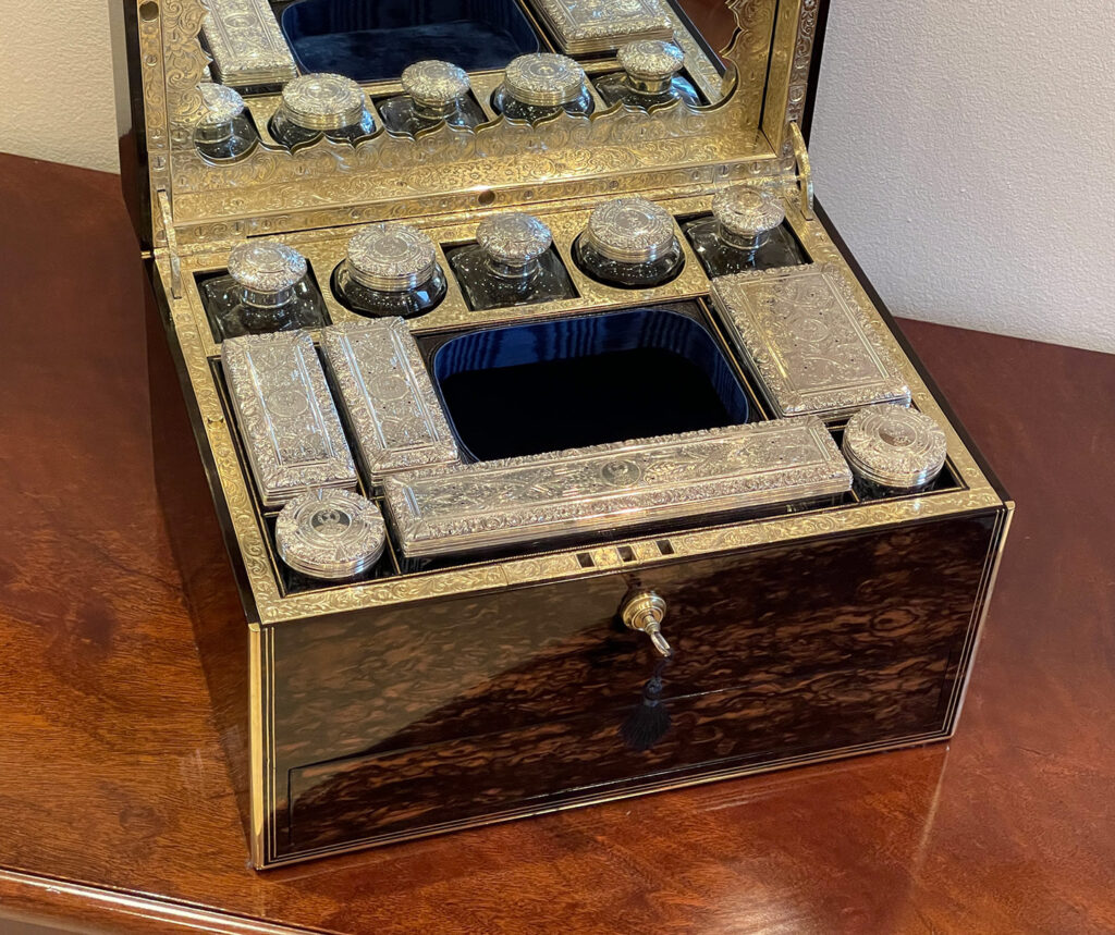 Close up interior view of an Antique Silver Mounted Dressing Case in Coromandel, by William Tooke.