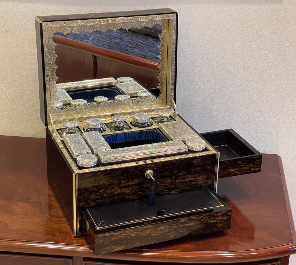Front left internal view of an Antique Silver Mounted Dressing Case in Coromandel, by William Tooke.