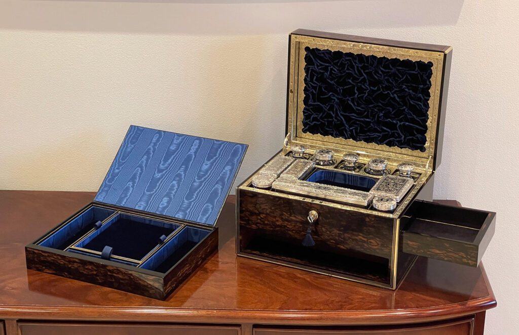 Front internal view of an Antique Silver Mounted Dressing Case in Coromandel, by William Tooke with front drawer removed.