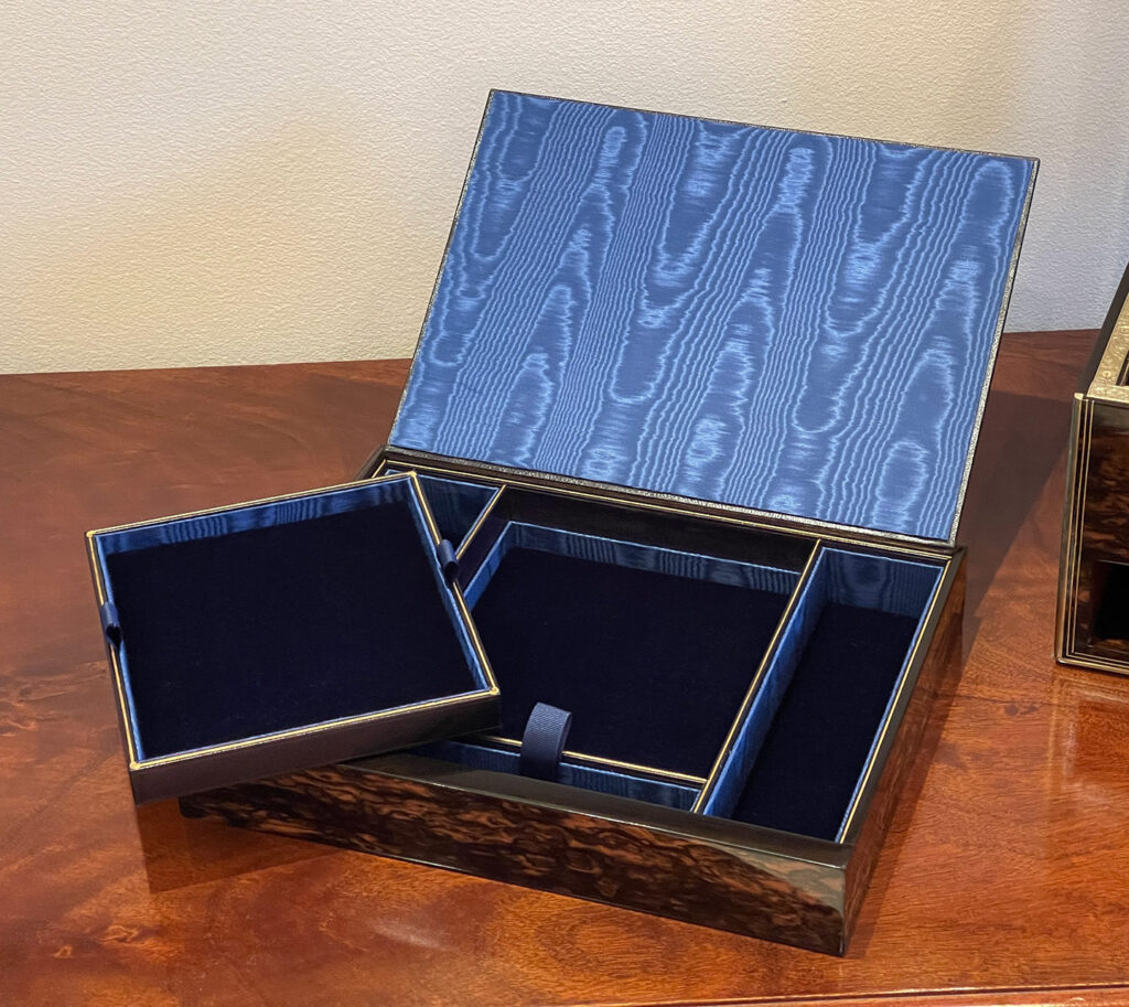 View of the lower drawer with tray removed from an Antique Silver Mounted Dressing Case in Coromandel, by William Tooke.