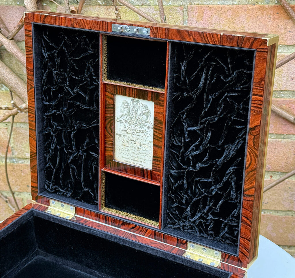 Closer angled view of the makers label from a Very Rare 1816 Edwards Retail Presentation Kingwood Jewellery Box.