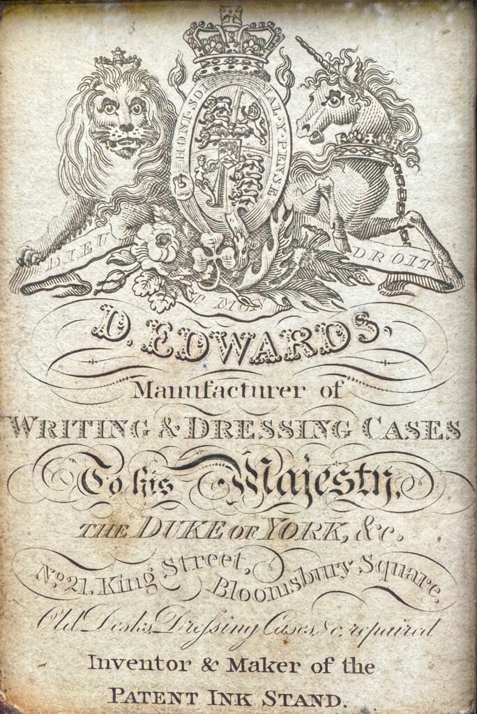 Close up view of the makers label from a Very Rare 1816 Edwards Retail Presentation Kingwood Jewellery Box.