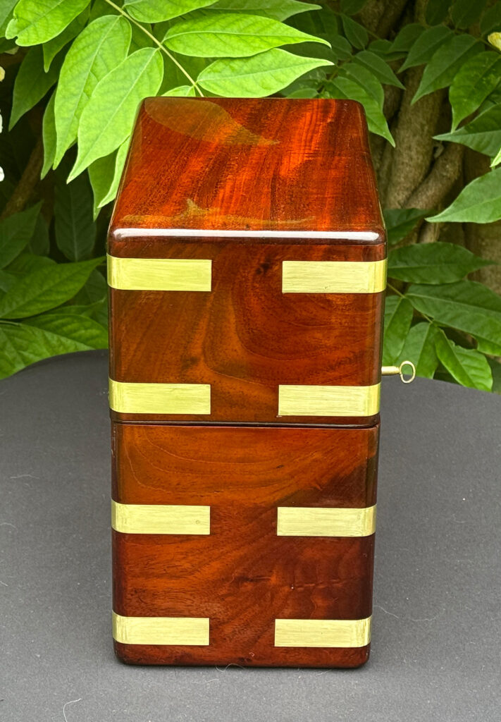 Left side view of an Antique Jewellery Strong Box in Cuban Mahogany, by Leuchars.