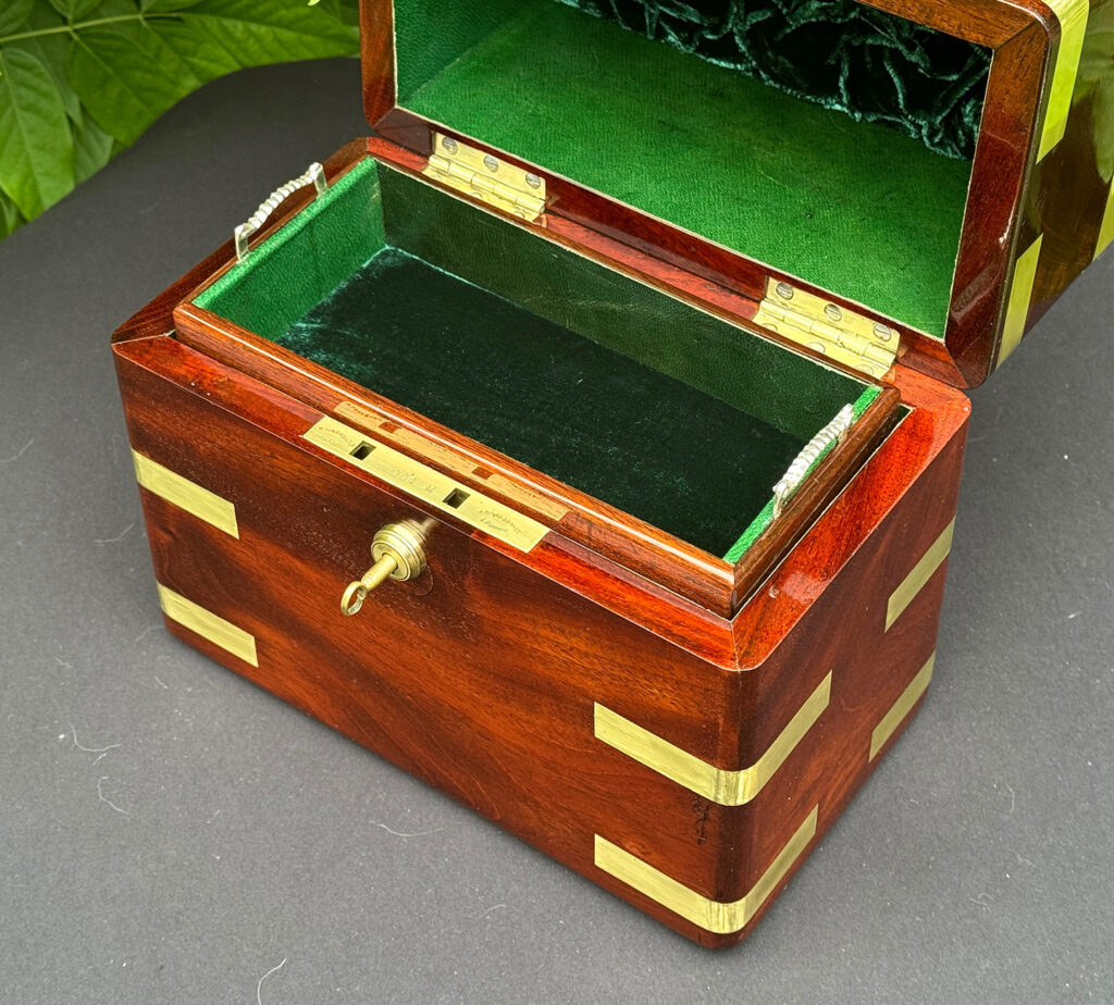 Overhead close up internal view of an Antique Jewellery Strong Box in Cuban Mahogany, by Leuchars.