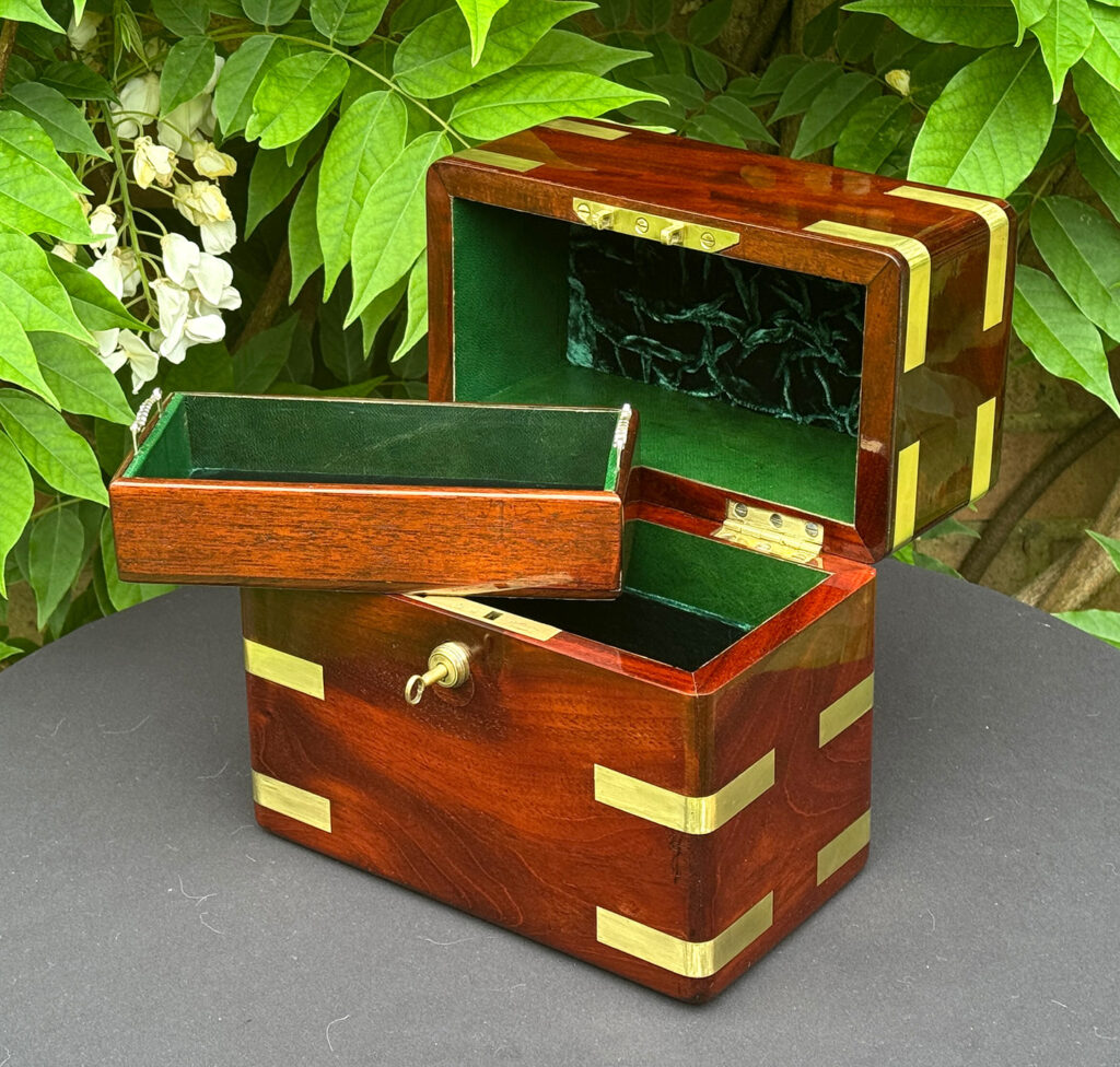 Front right internal view of an Antique Jewellery Strong Box in Cuban Mahogany, by Leuchars with tray removed.