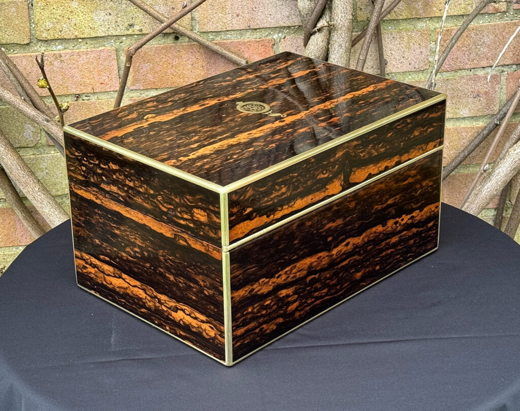 Rear right view of an Antique Jewellery Box in Coromandel, by Halstaff and Hannaford.