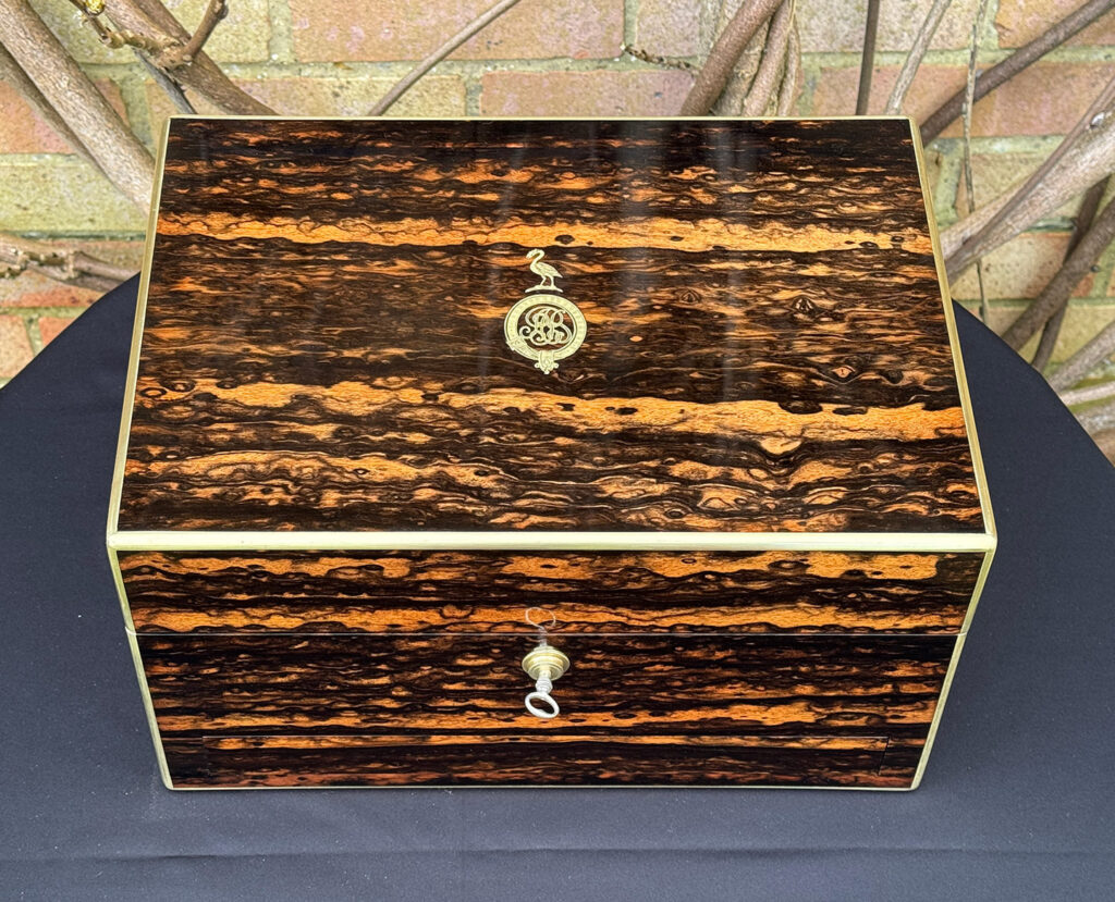Top view of an Antique Jewellery Box in Coromandel, by Halstaff and Hannaford.