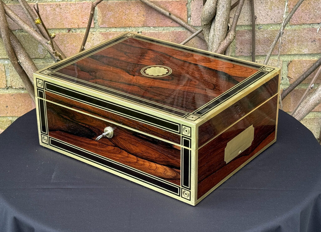 Front right view of an Antique Jewellery Box in Rosewood with Ebony and Brass Inlay.