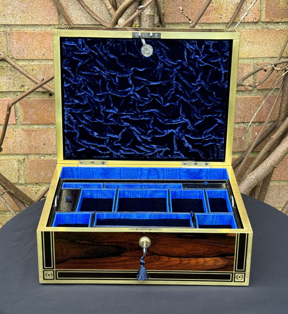 Front internal view of an Antique Jewellery Box in Rosewood with Ebony and Brass Inlay.