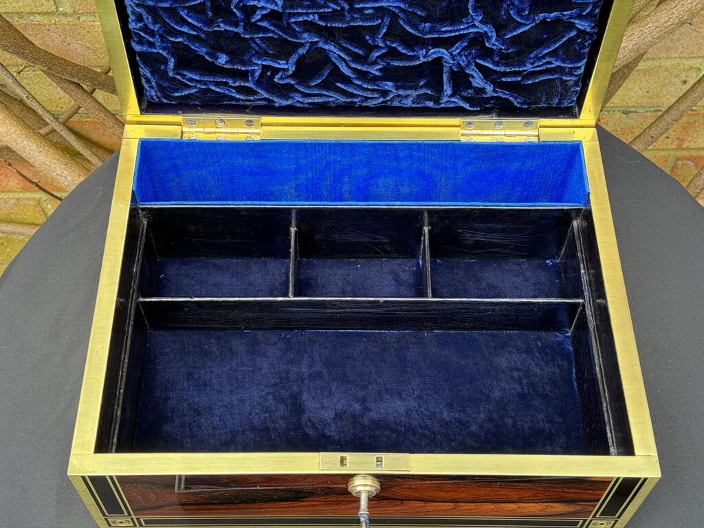 View of interior base section from an Antique Jewellery Box in Rosewood with Ebony and Brass Inlay.