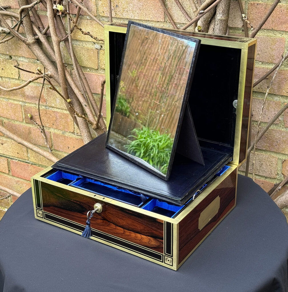 Front right internal view of an Antique Jewellery Box in Rosewood with Ebony and Brass Inlay with mirror panel removed.