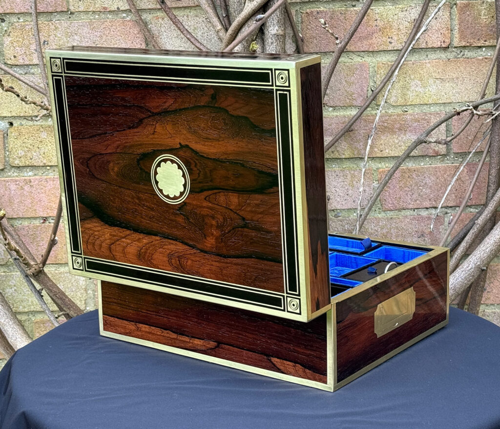 Rear open view of an Antique Jewellery Box in Rosewood with Ebony and Brass Inlay.
