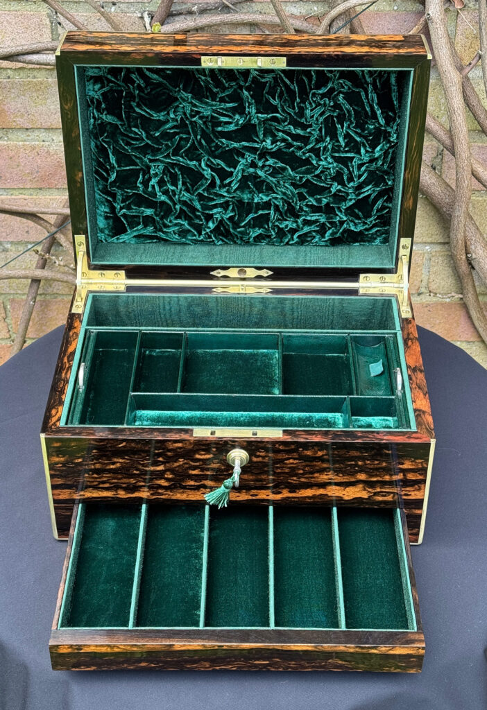 Front overhead internal view of an Antique Jewellery Box in Coromandel, by Halstaff and Hannaford.
