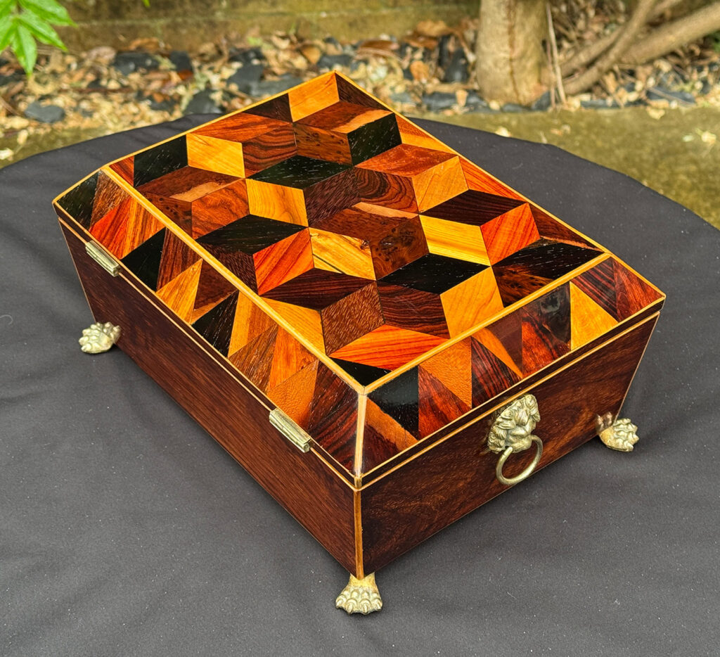 Rear left overhead view of a Rare George III Antique Jewellery Box with ‘Tumbling Cube’ Parquetry Inlay.