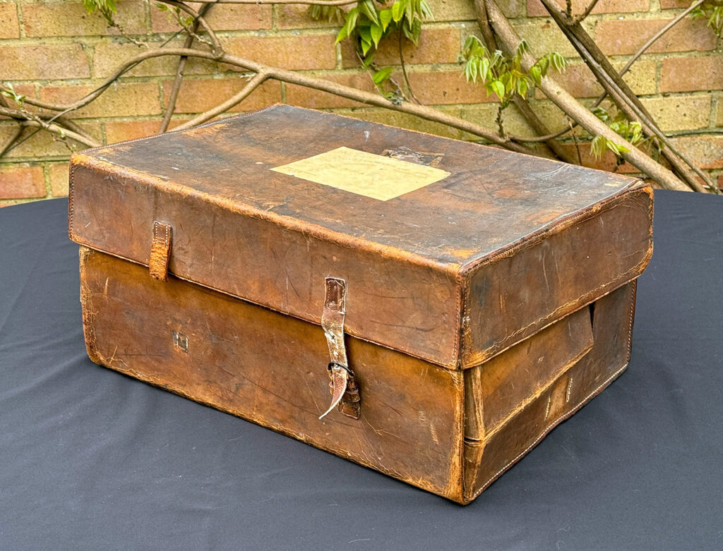 Front right view of the leather outer case containing an Extra Large Antique Expanding Jewellery Box in Calamander.