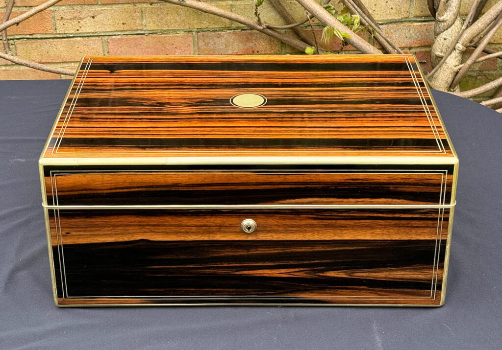 Front view of an Extra Large Antique Expanding Jewellery Box in Calamander.