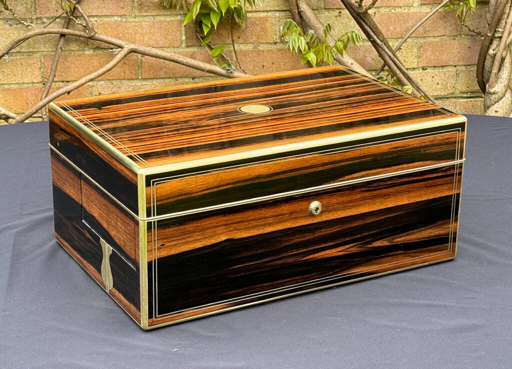 Front left view of an Extra Large Antique Expanding Jewellery Box in Calamander.
