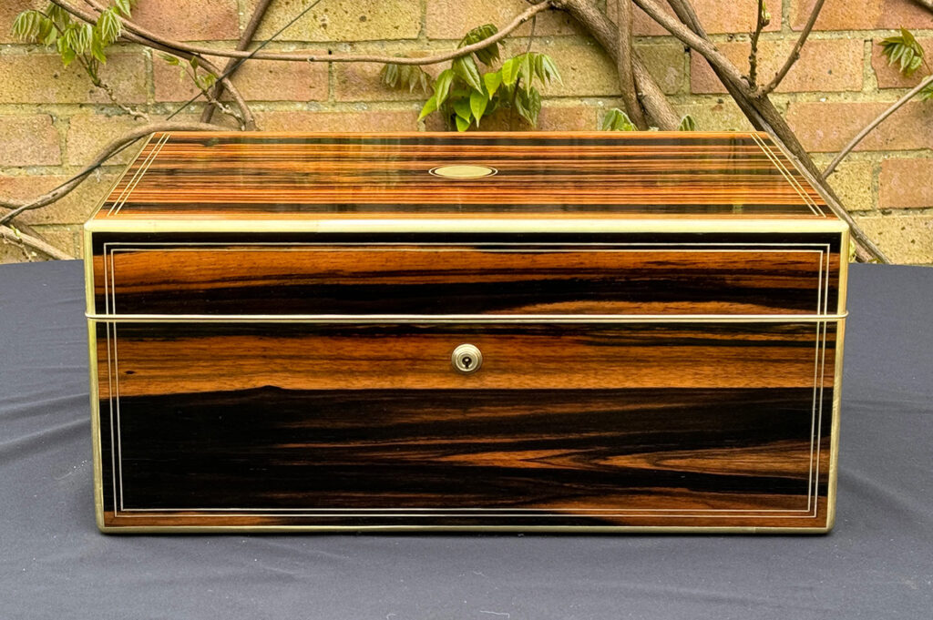 Front view of an Extra Large Antique Expanding Jewellery Box in Calamander.