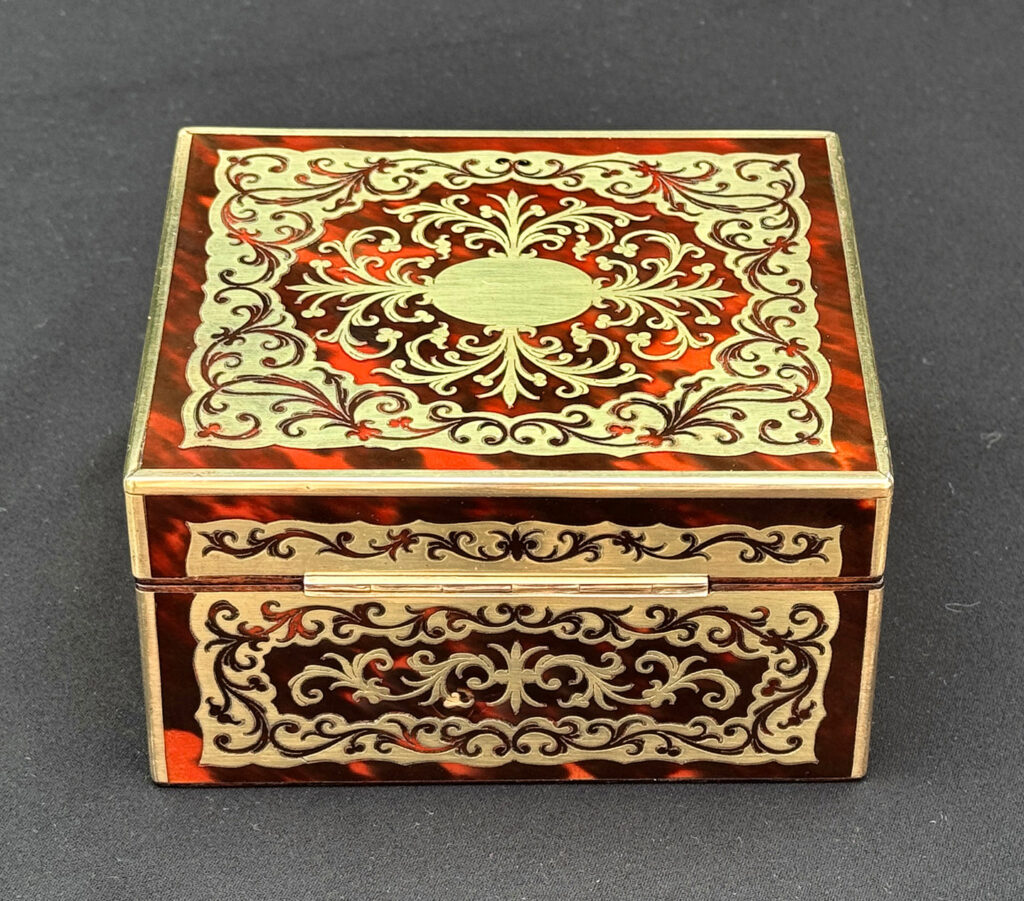 Rear overhead view of an Antique Miniature Boulle Jewellery Box with Bramah Lock.