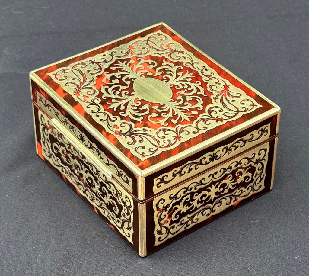 Rear left overhead view of an Antique Miniature Boulle Jewellery Box with Bramah Lock.