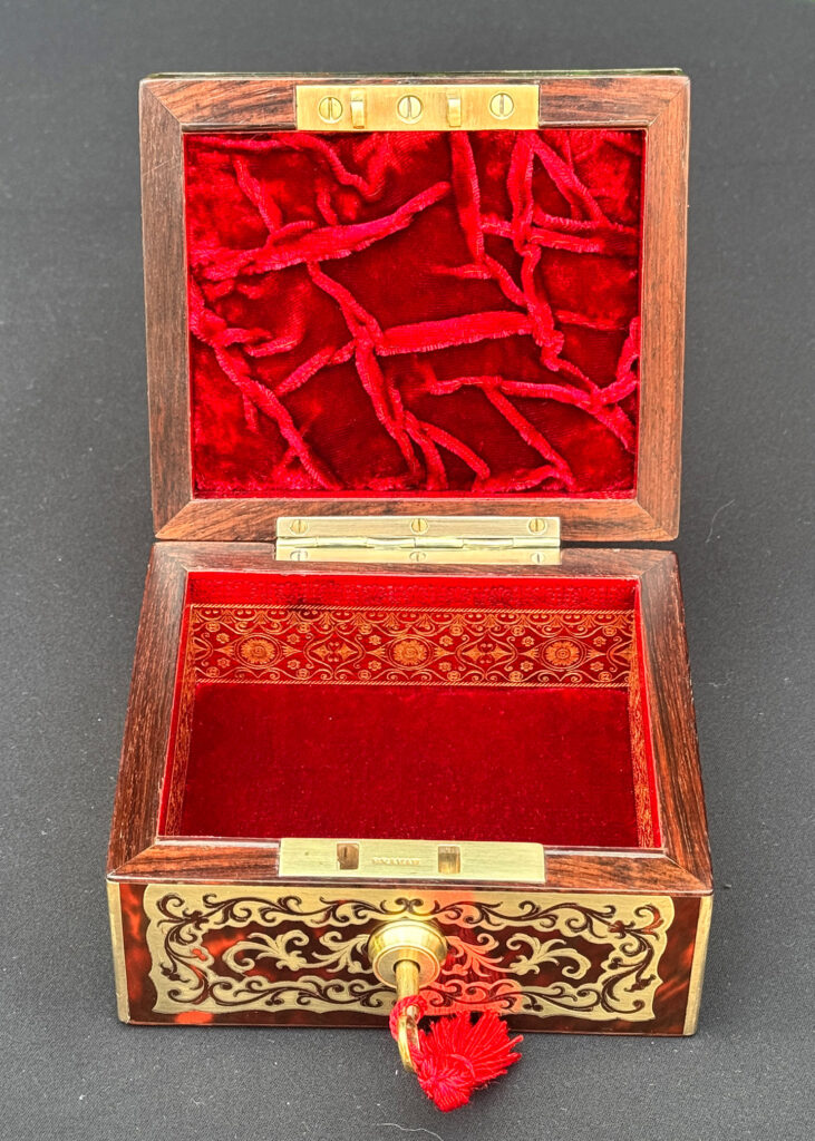 Front open view of an Antique Miniature Boulle Jewellery Box with Bramah Lock.