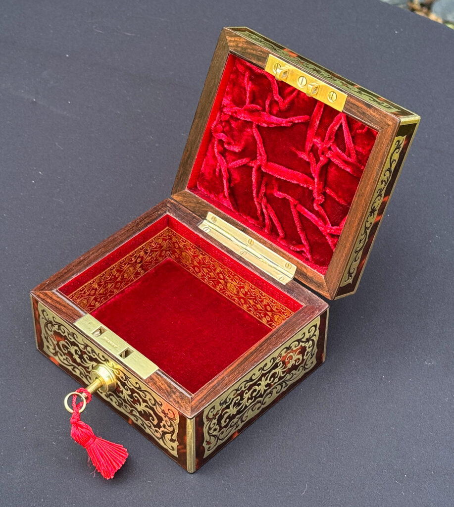 Overhead right internal view of an Antique Miniature Boulle Jewellery Box with Bramah Lock.