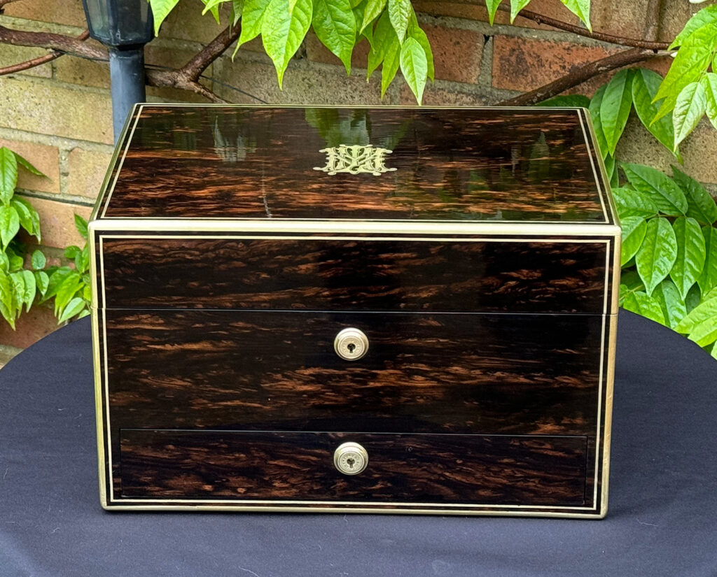 Front view of an Antique Jewellery Box in Coromandel, by Asprey.