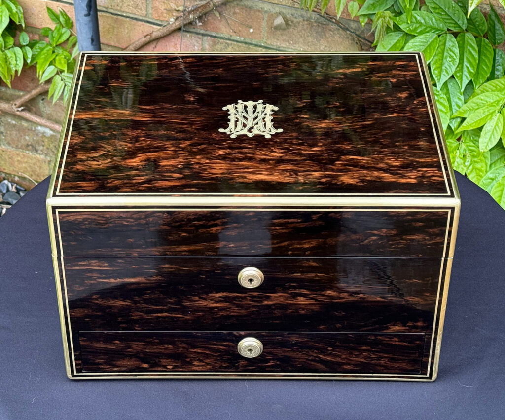 Front overhead view of an Antique Jewellery Box in Coromandel, by Asprey.
