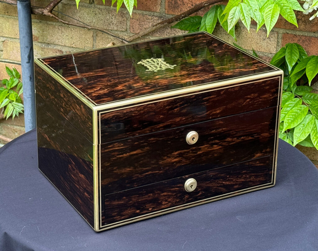 Front left view of an Antique Jewellery Box in Coromandel, by Asprey.