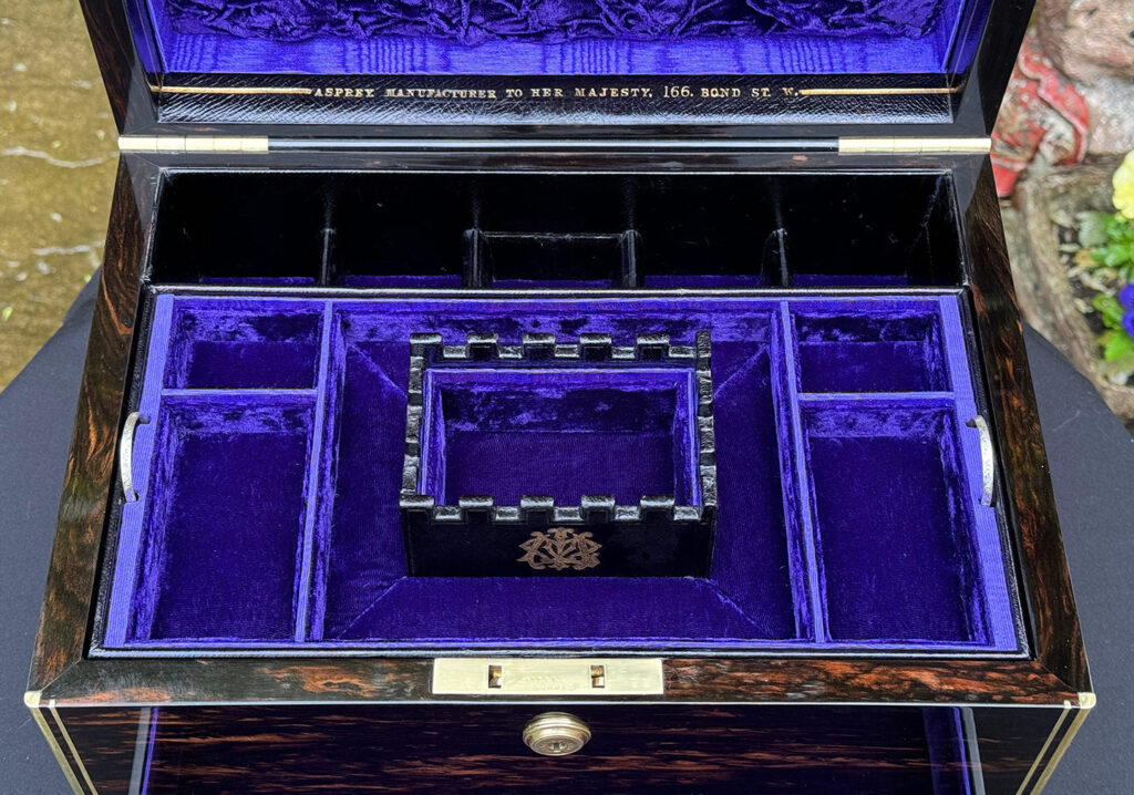 Close up of the castellated interior section from an Antique Jewellery Box in Coromandel, by Asprey.