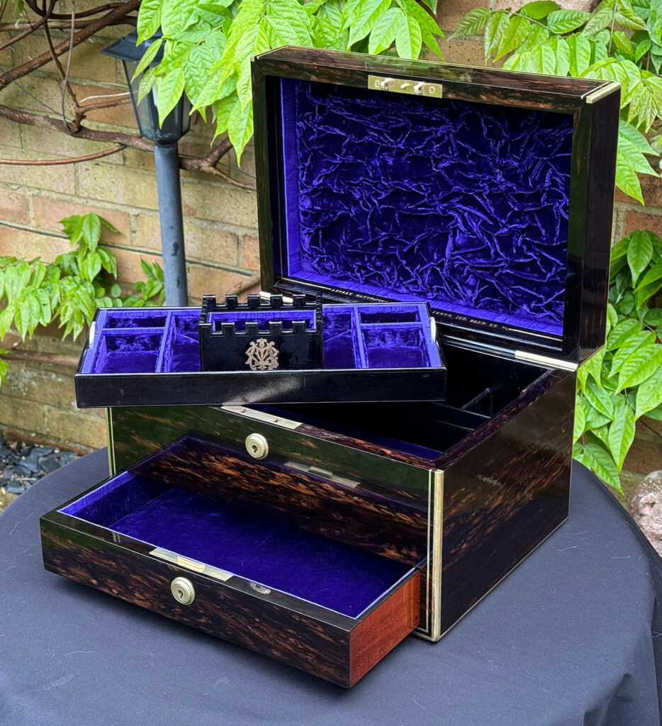 Front right internal view of an Antique Jewellery Box in Coromandel, by Asprey with tray removed.