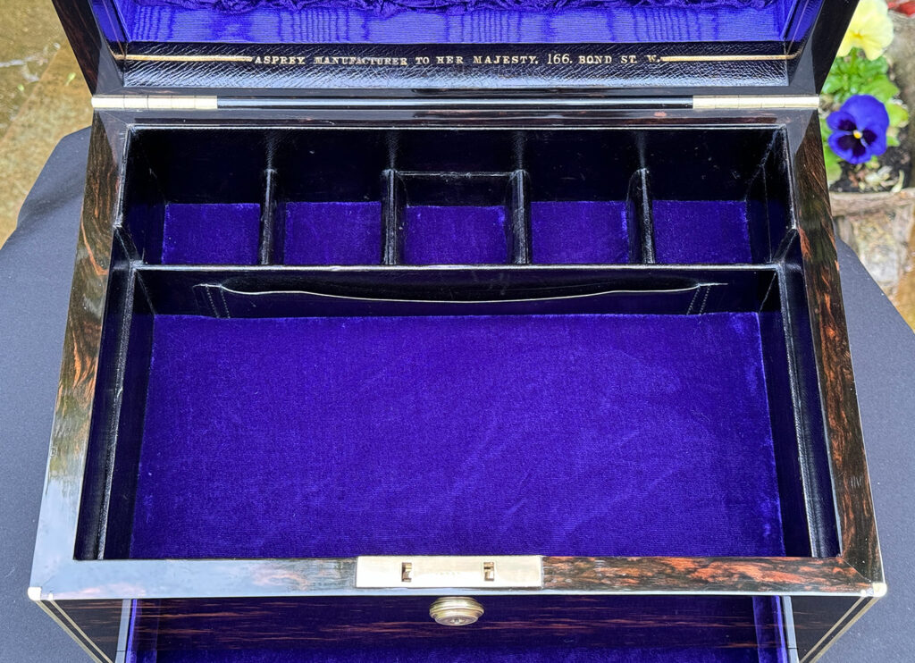 Interior view of base section from an Antique Jewellery Box in Coromandel, by Asprey.