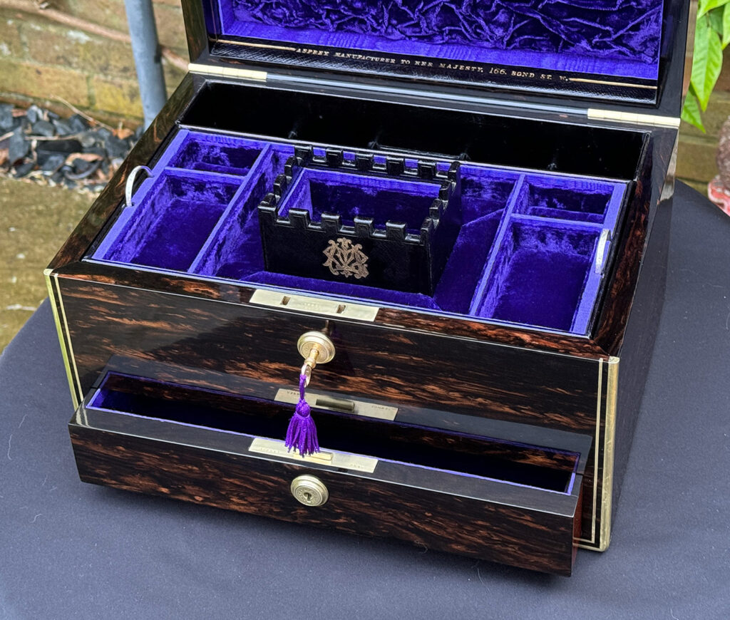 Closer overhead internal view of an Antique Jewellery Box in Coromandel, by Asprey.
