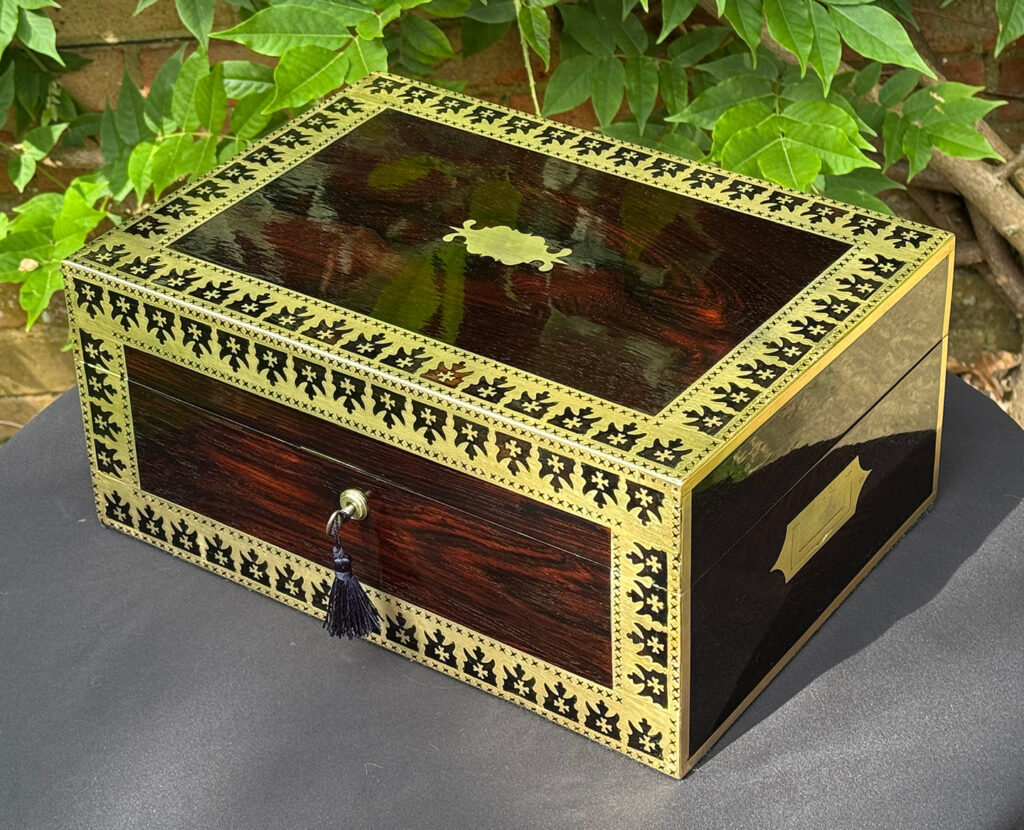 Front right view of an Antique Jewellery Box in Rosewood with Decorative Brass Inlay.