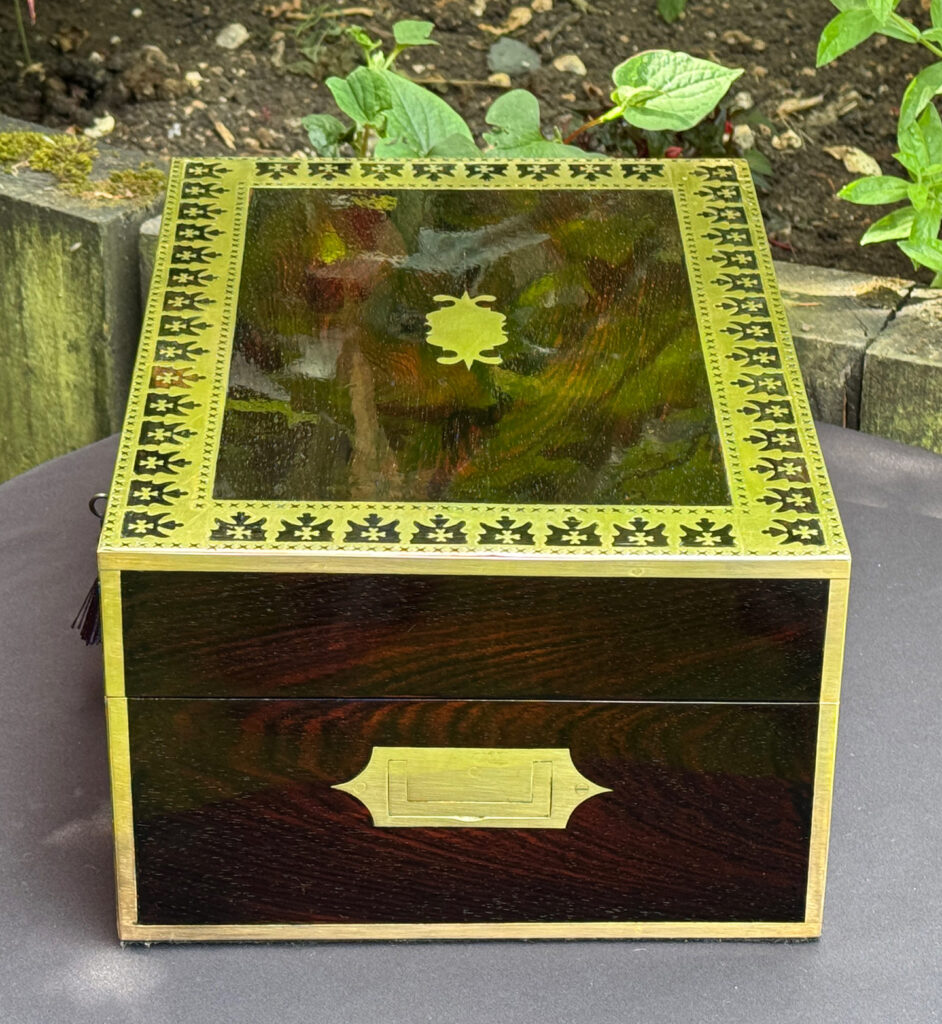 Right side view of an Antique Jewellery Box in Rosewood with Decorative Brass Inlay.