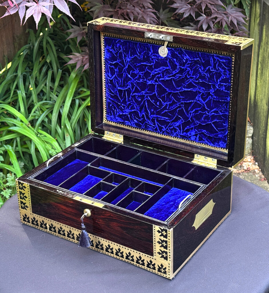 Front right internal view of an Antique Jewellery Box in Rosewood with Decorative Brass Inlay.