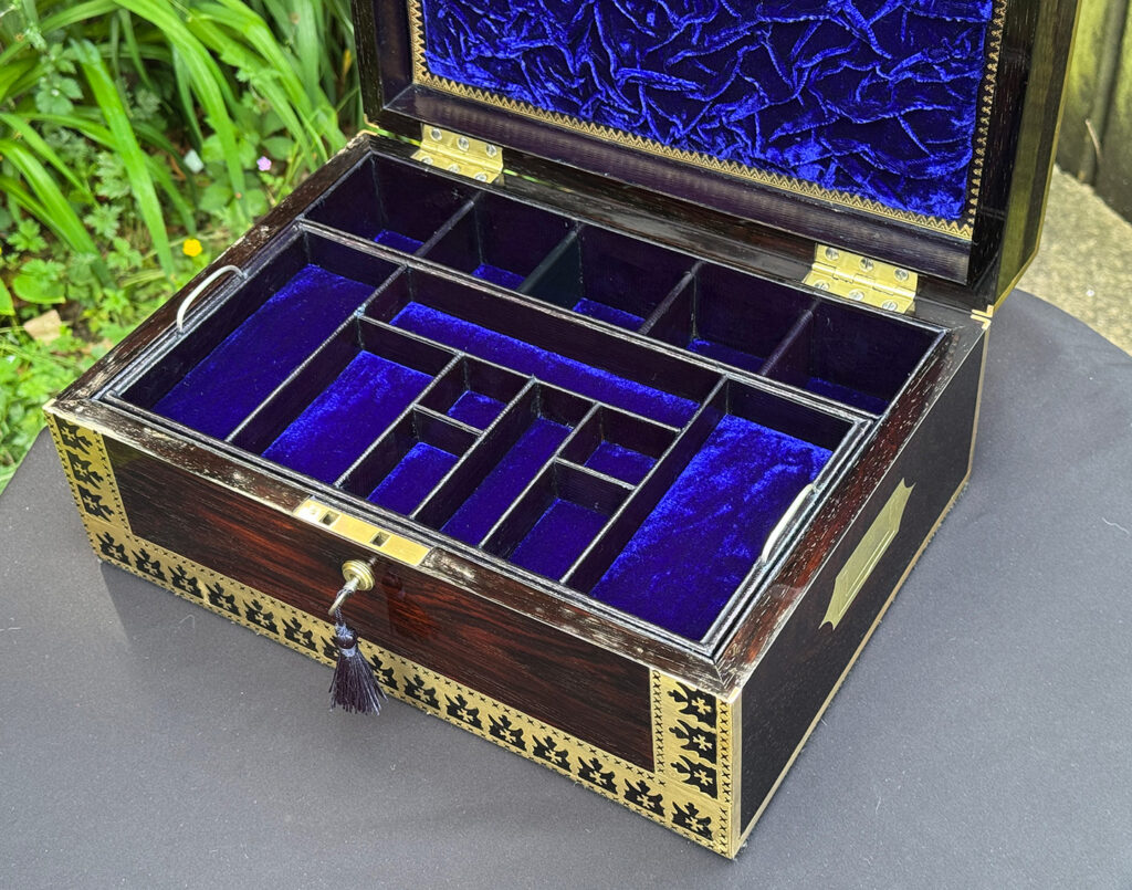 Closer internal view of an Antique Jewellery Box in Rosewood with Decorative Brass Inlay.