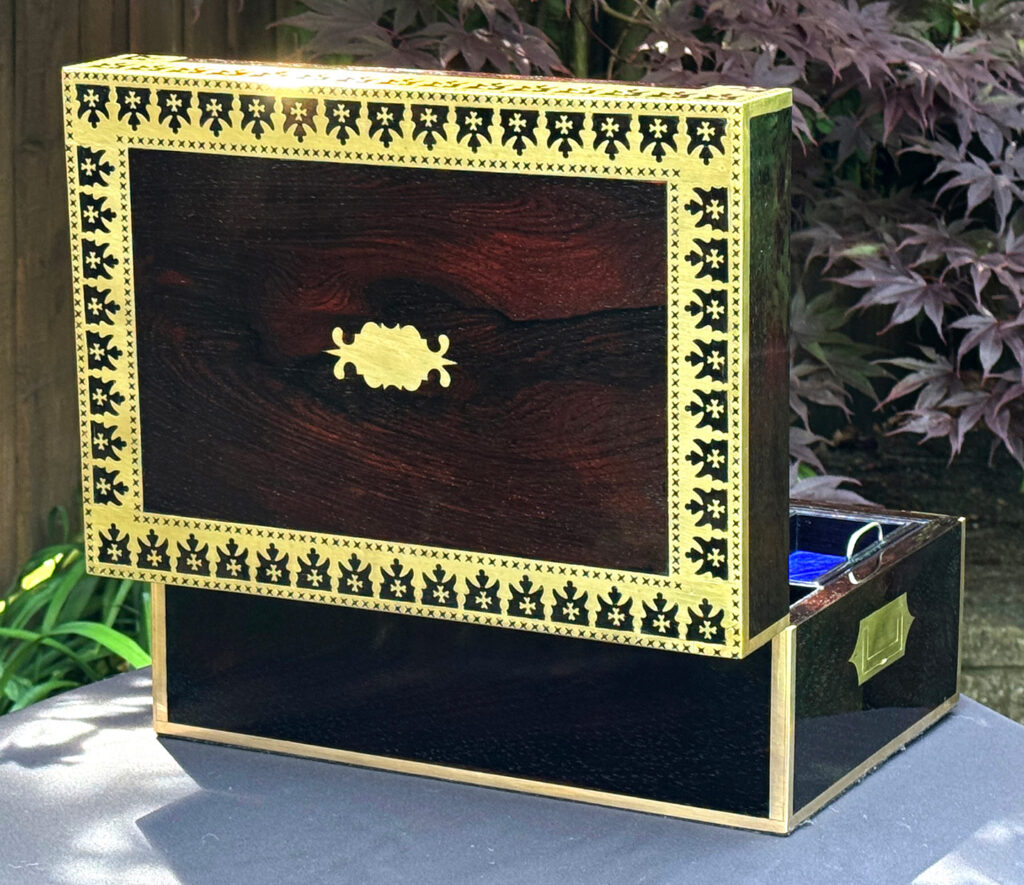 Rear open view of an Antique Jewellery Box in Rosewood with Decorative Brass Inlay.