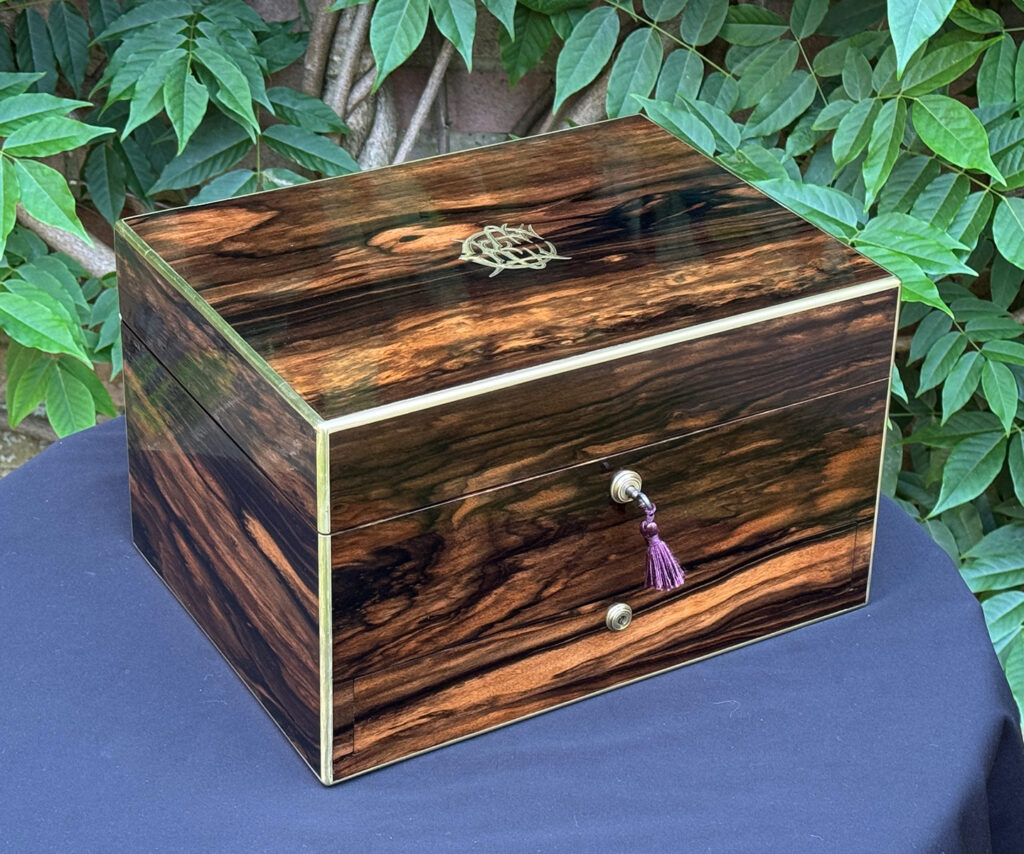 Front left view of an Antique Jewellery Box in Coromandel by Pittway Brothers.