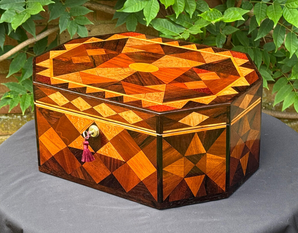 Front right view of a Large Antique Octagonal Jewellery Box with Parquetry Inlay.