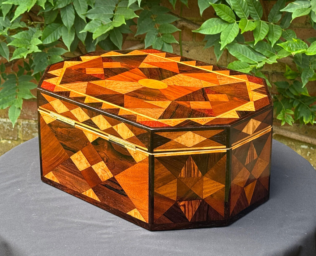 Rear left view of a Large Antique Octagonal Jewellery Box with Parquetry Inlay.