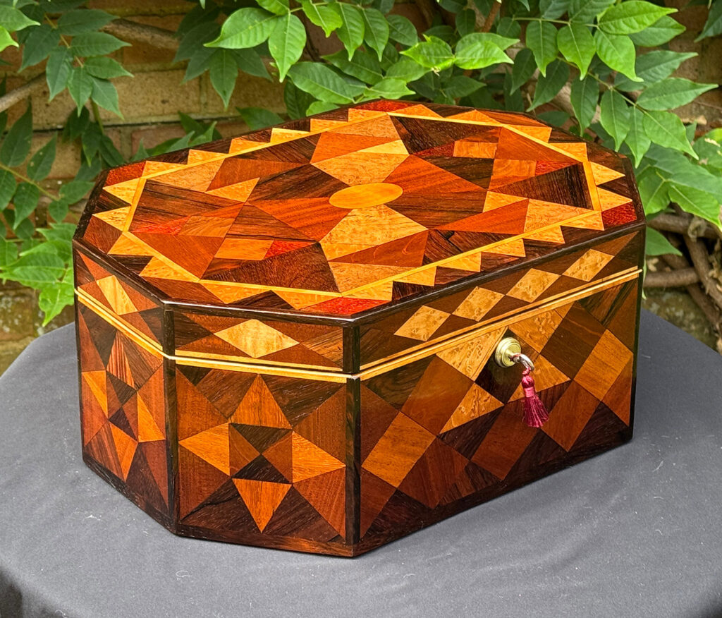 Front left view of a Large Antique Octagonal Jewellery Box with Parquetry Inlay.