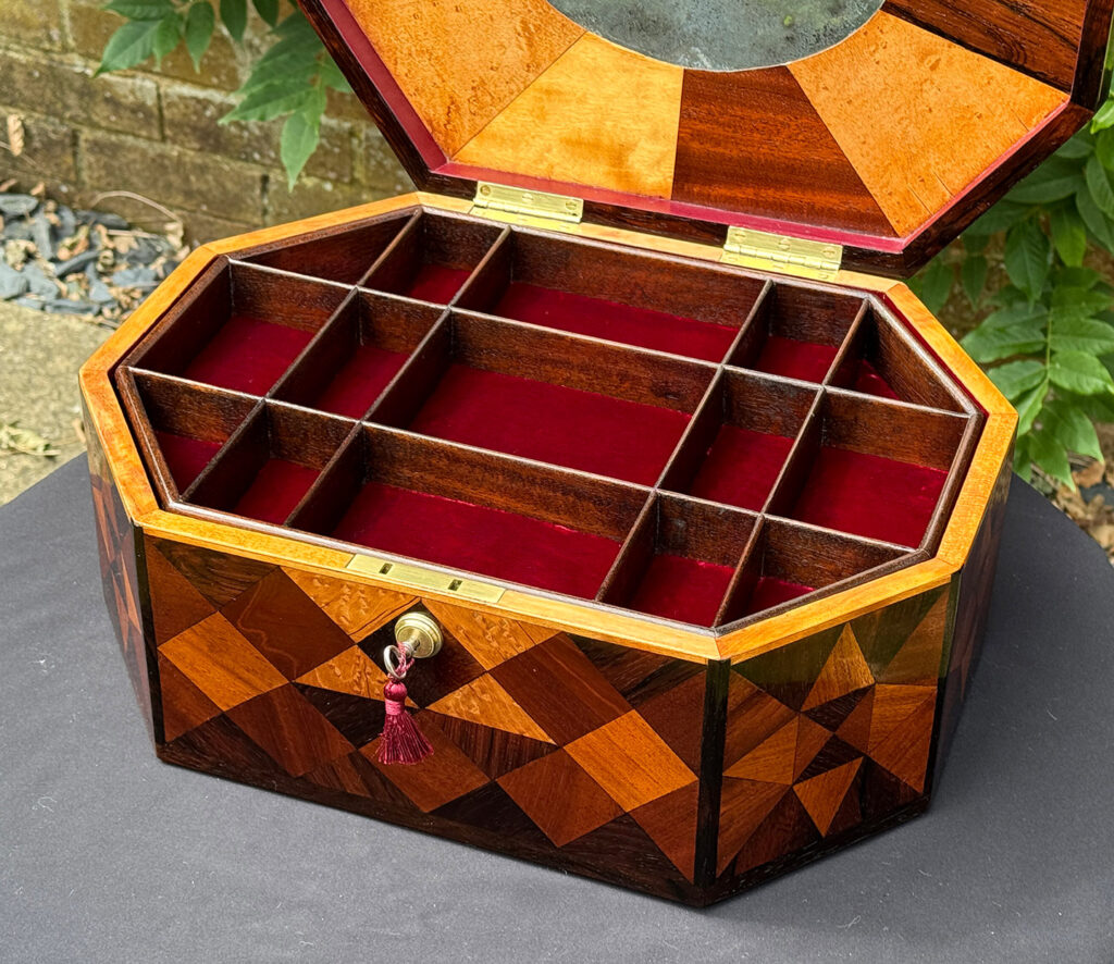 Front right internal view of a Large Antique Octagonal Jewellery Box with Parquetry Inlay.