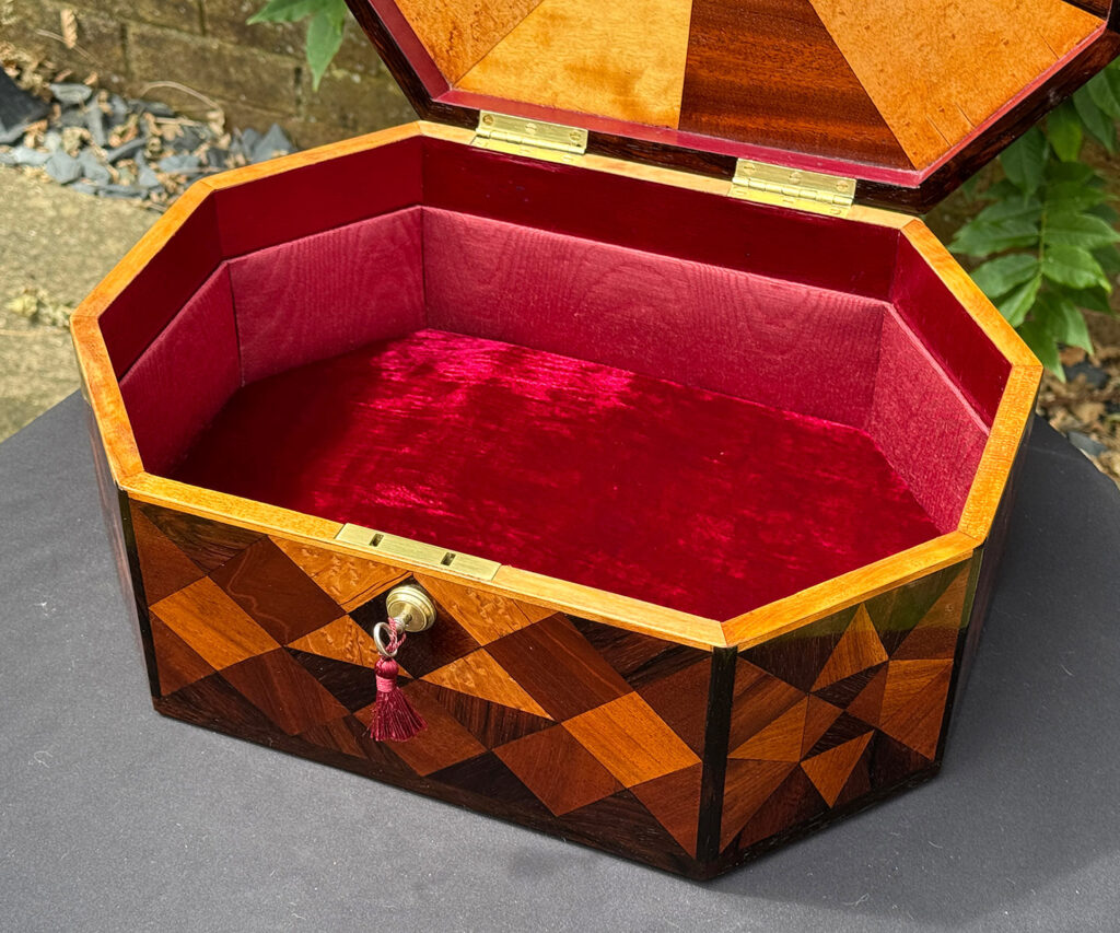 Front close up internal view of a Large Antique Octagonal Jewellery Box with Parquetry Inlay.