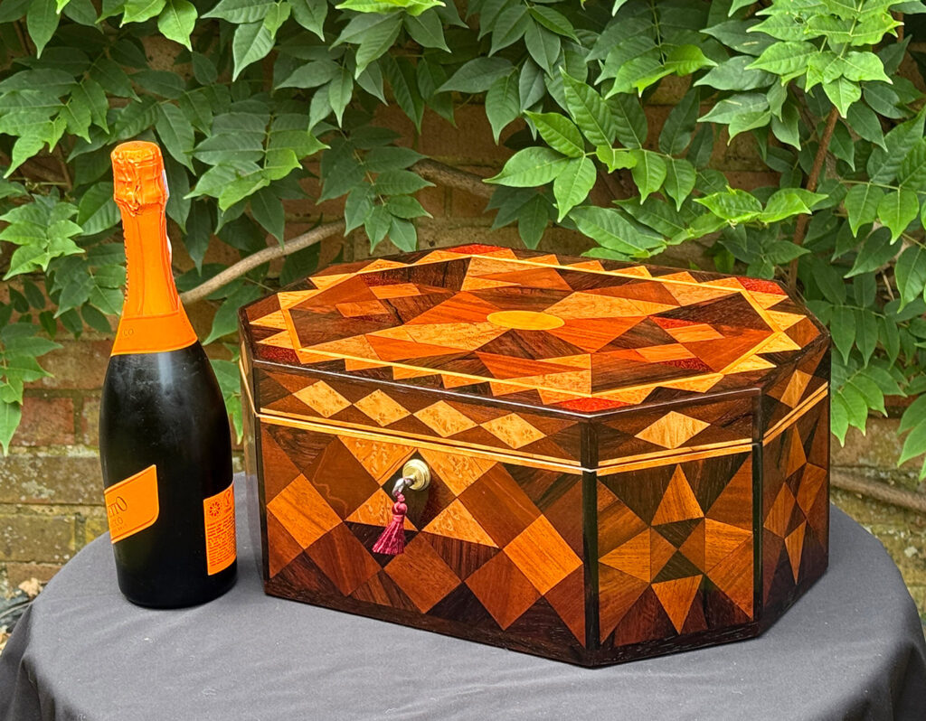 Size comparison of a Large Antique Octagonal Jewellery Box with Parquetry Inlay.