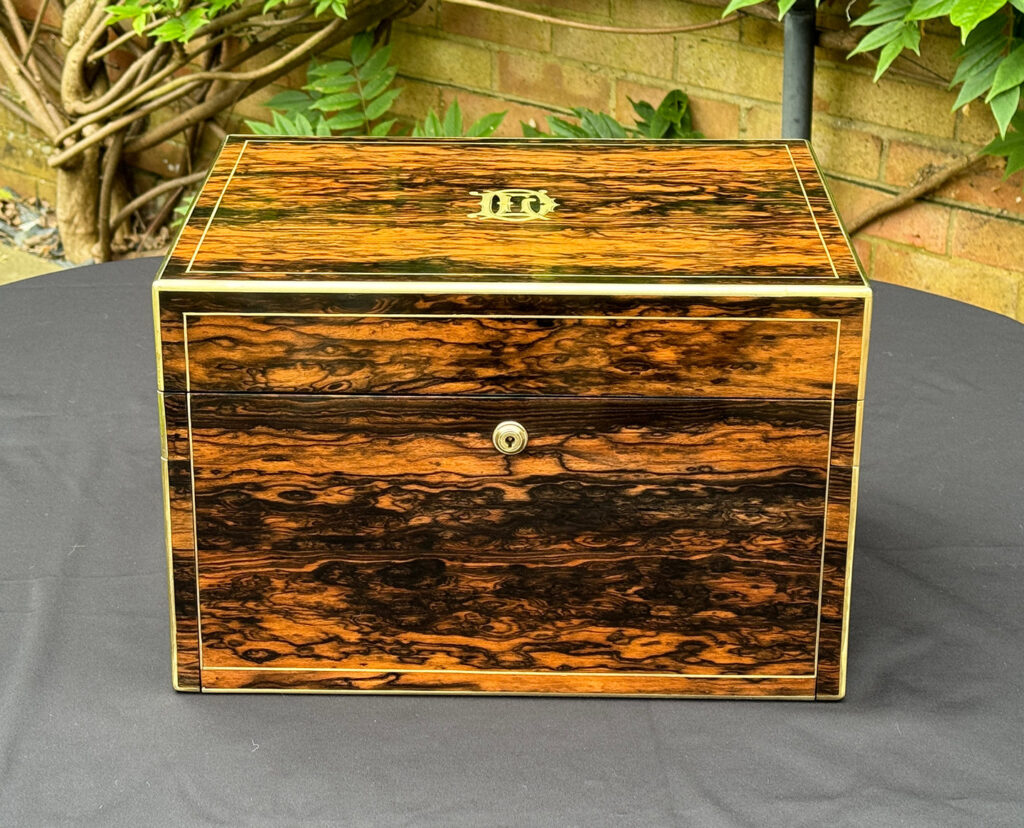 Front view of a Large Antique Jewellery Box in Coromandel with Cantilever Mechanism.