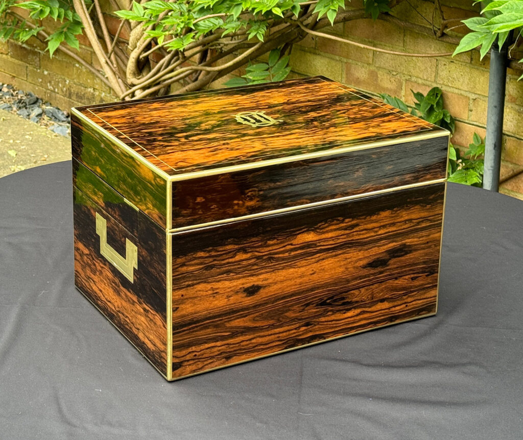 Rear right view of a Large Antique Jewellery Box in Coromandel with Cantilever Mechanism.